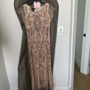 Stunning, nude color beaded gown